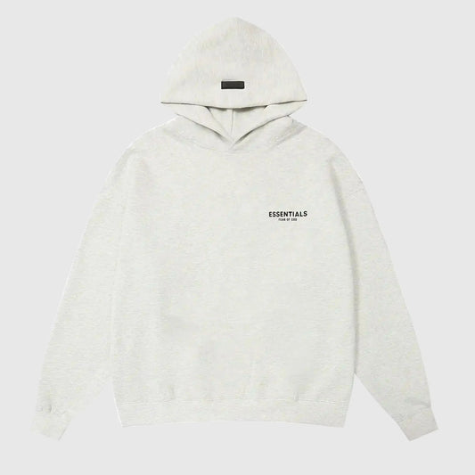 Fear of God Essentials Cloud Dance hoodie front view with rubberized black bar branding
