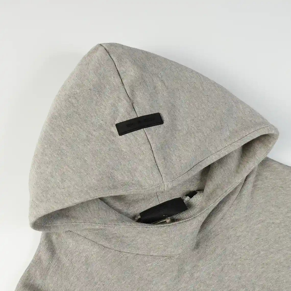 essentials dark heather oatmeal hoodie front view minimalist design