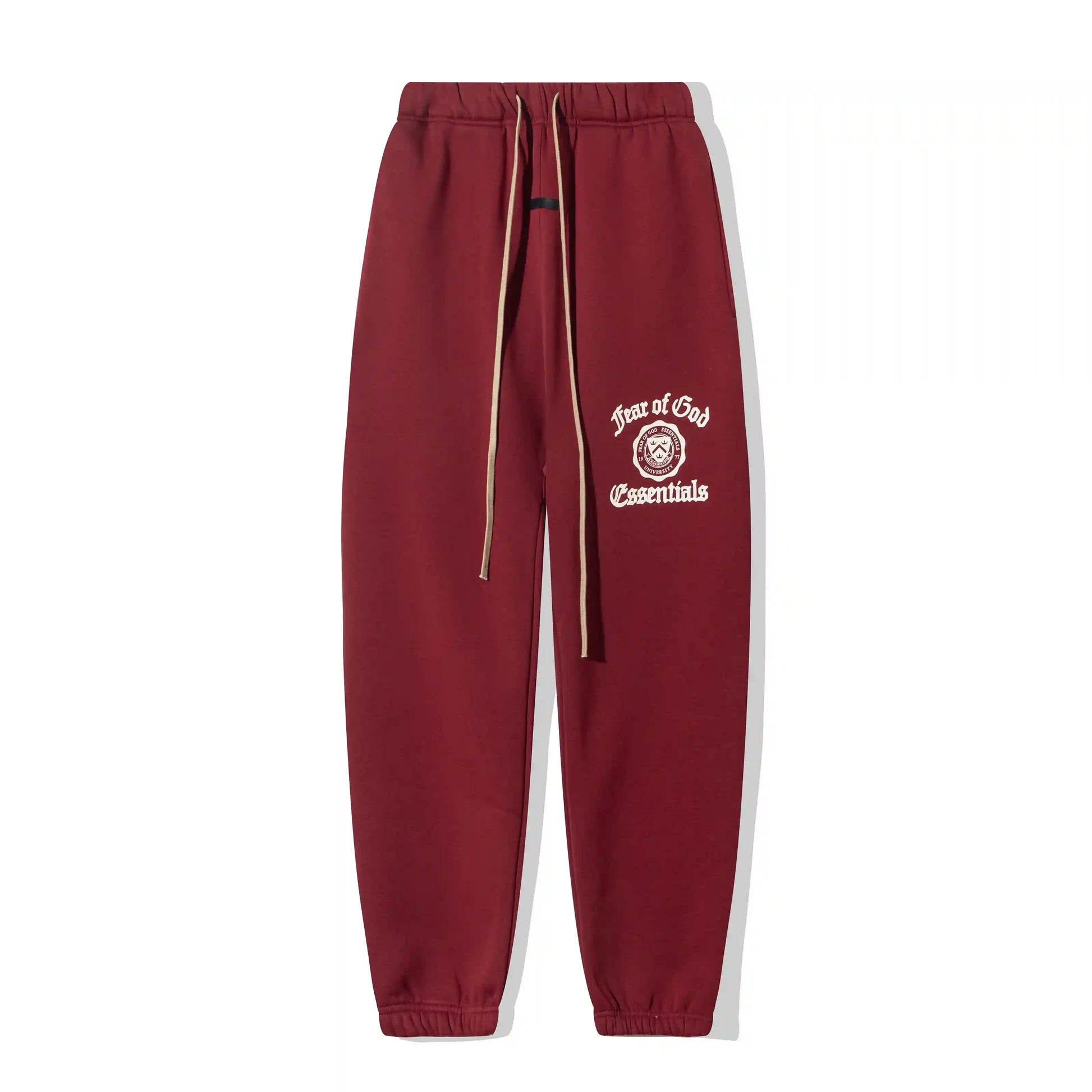 Essentials coordinated red tracksuit outfit set by Fear Of God