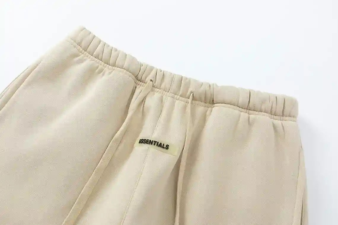 Premium fleece fabric detail on light cream sweatpants by Fear of God