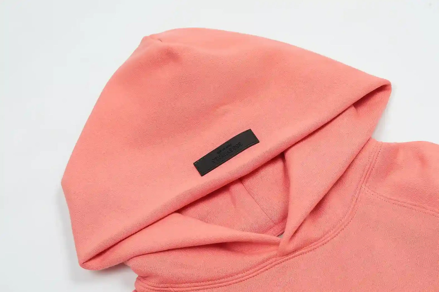 essentials coral hoodie front view casual style
