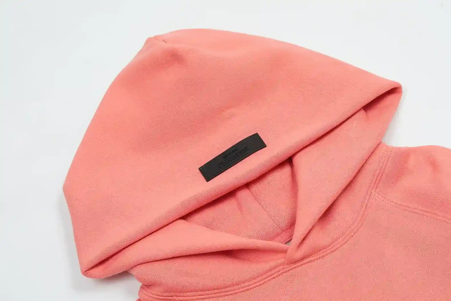 essentials coral hoodie front view casual style