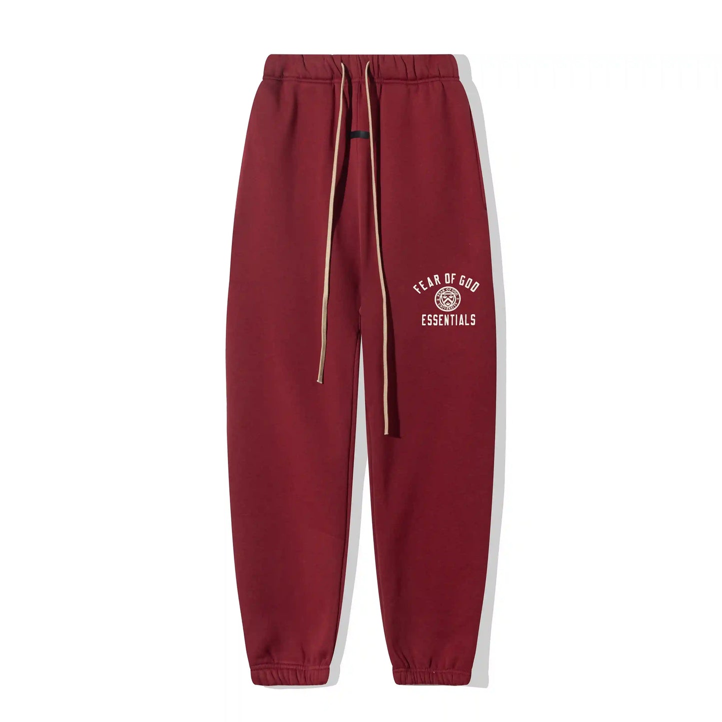 Dark chestnut tracksuit worn with sneakers lifestyle image by Fear Of God