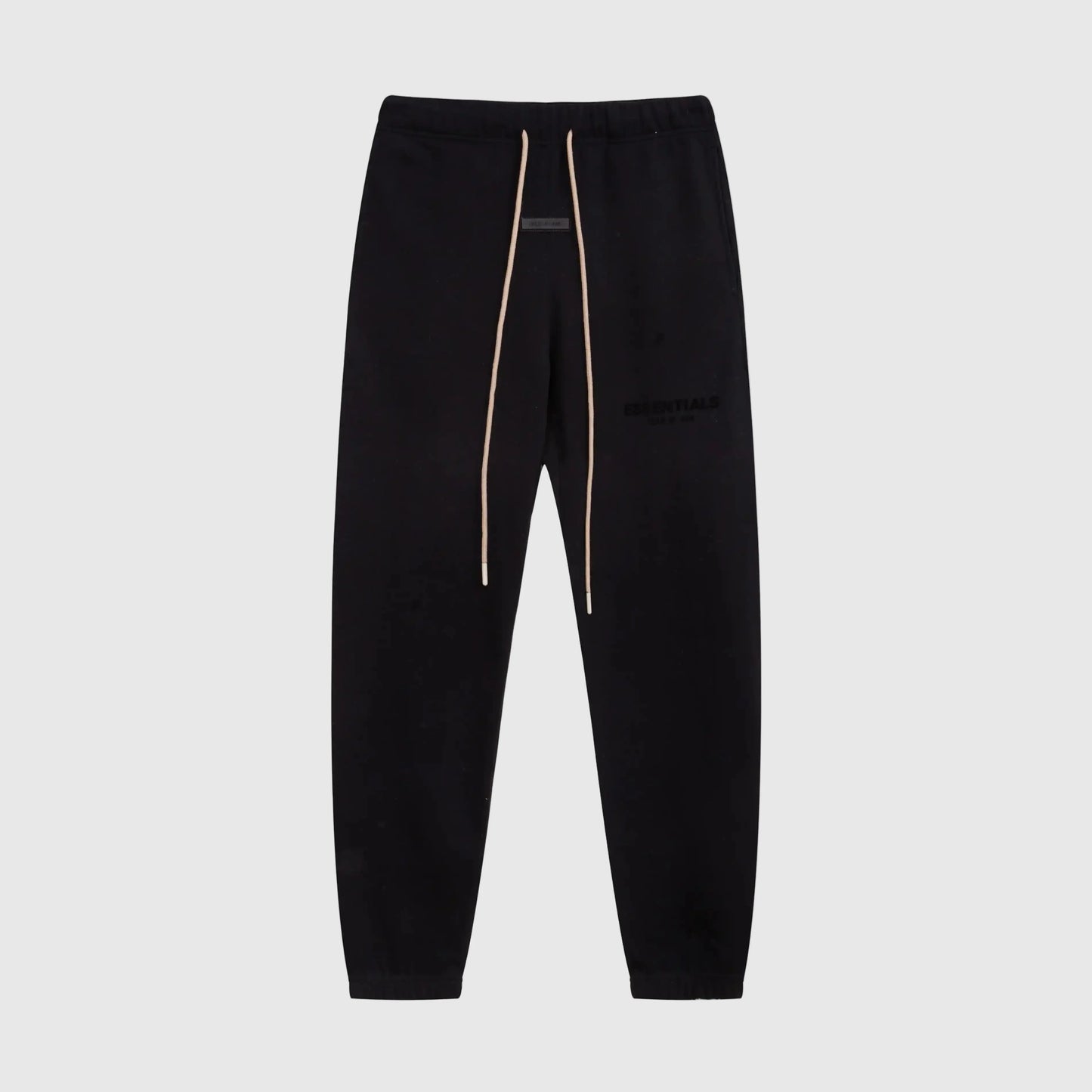 Essentials black low-key street sweatpants by Fear of God front view