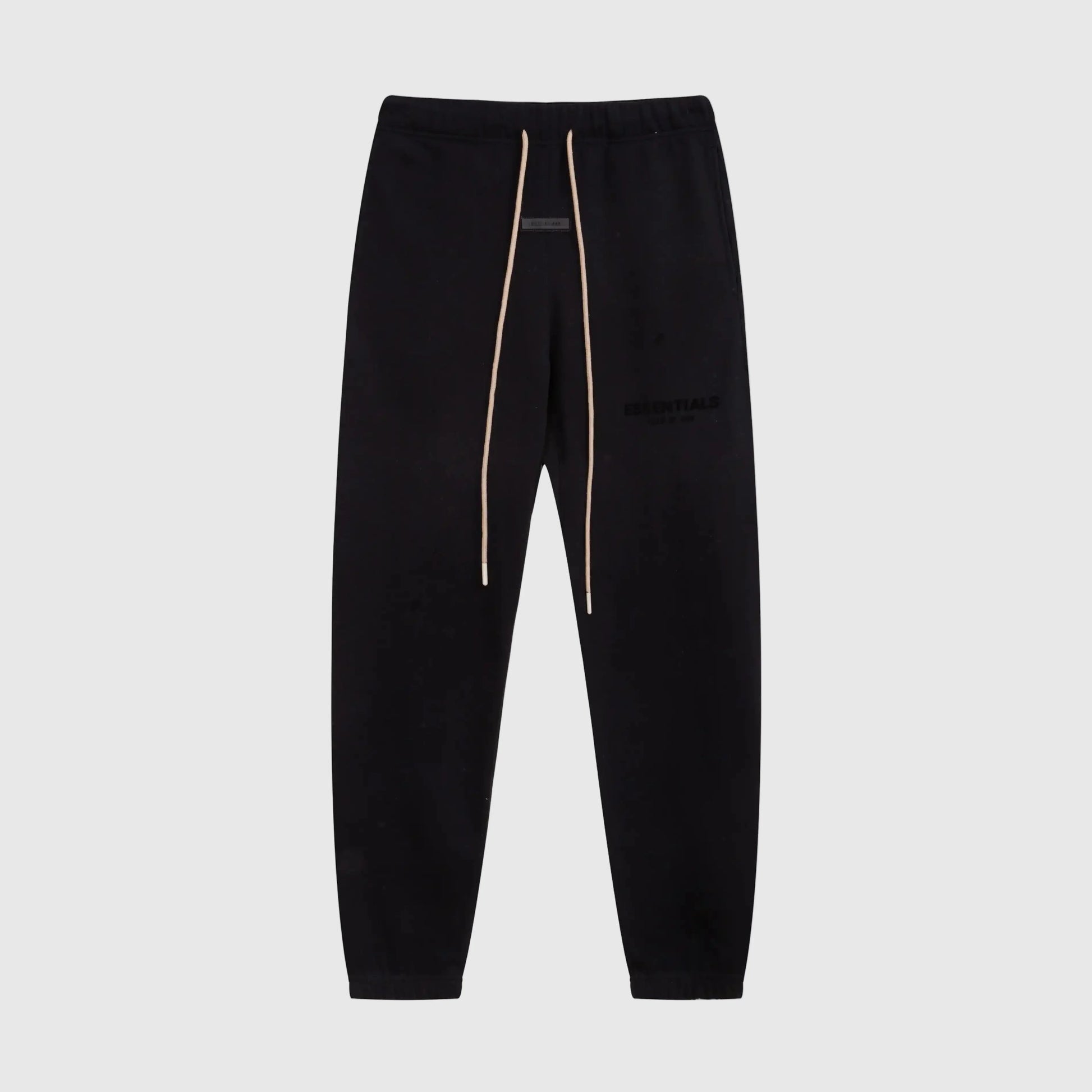 Essentials black low-key street sweatpants by Fear of God front view