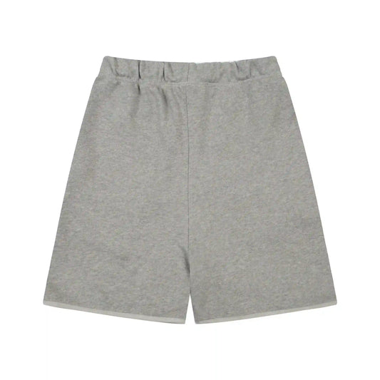 Essentials dark heather oatmeal relaxed shorts by Fear of God styled with tee