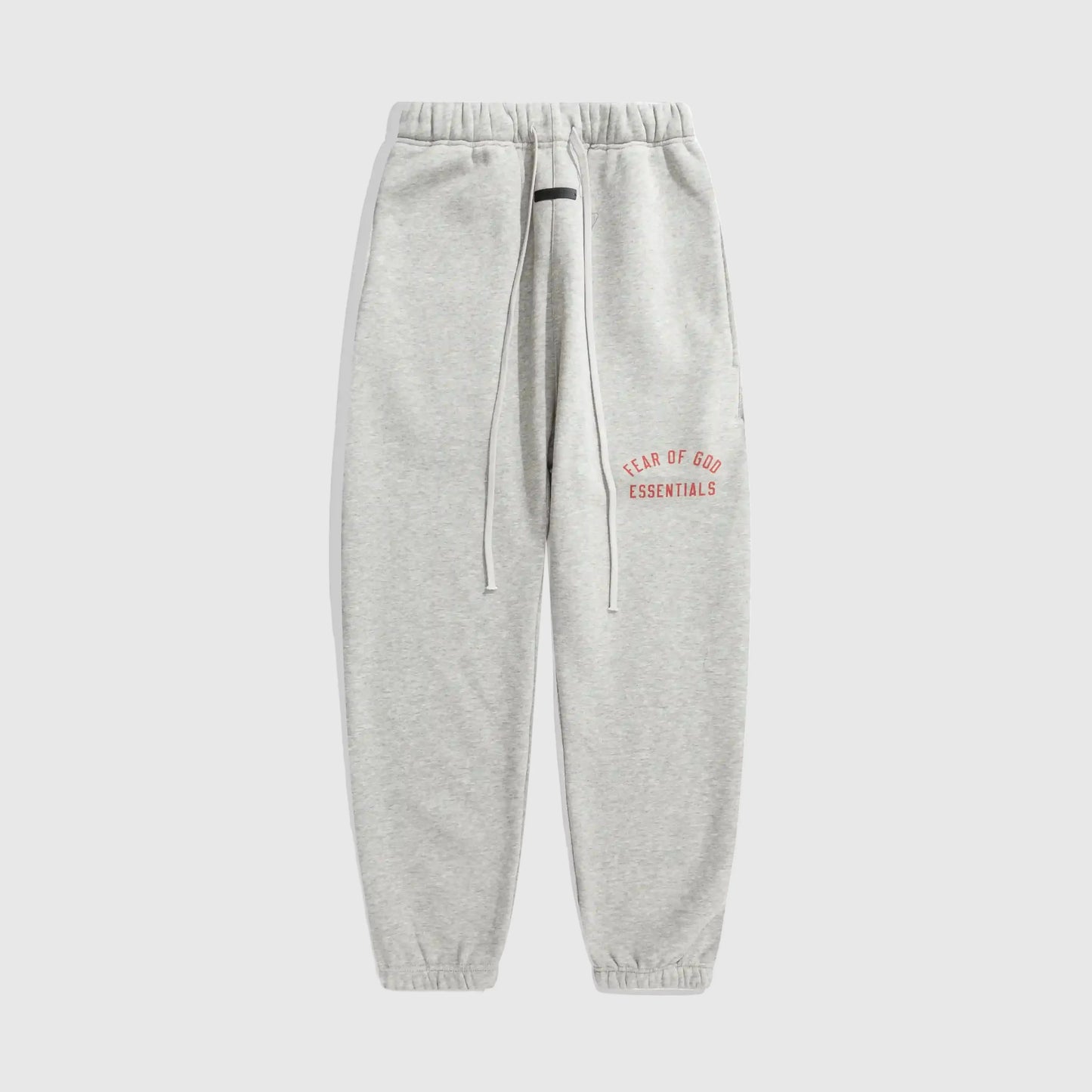 Essentials light heather oatmeal streetwear fleece sweatpants by Fear of God front view