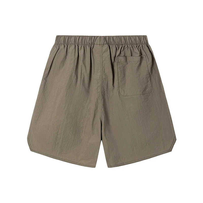 Brown shorts on a white background
