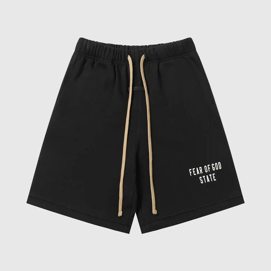 Fear of God Essentials black fleece shorts with tonal branding and long drawstrings