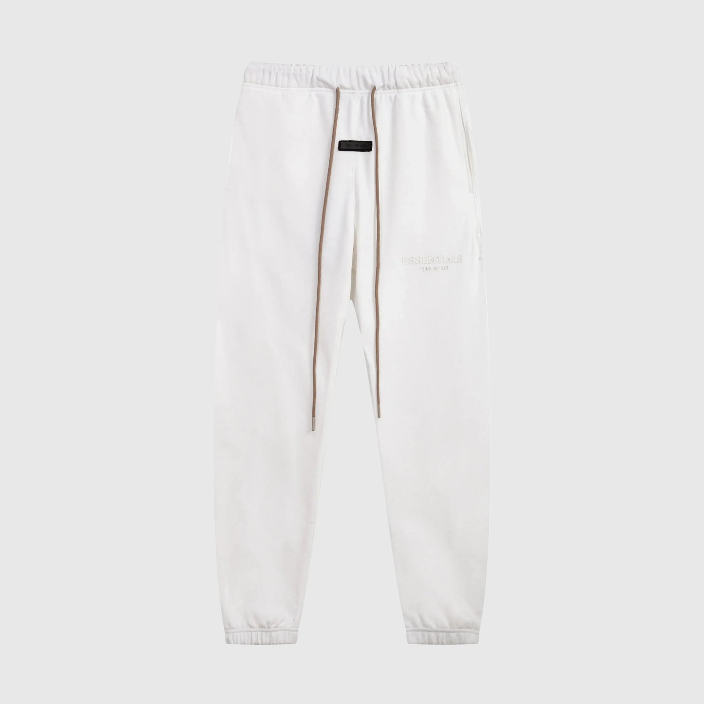 Essentials eggshell elevated fleece sweatpants by Fear of God front view