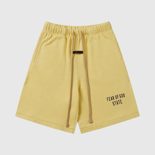 Fear of God Essentials Garden Yellow fleece shorts with drawstring waist and tonal logo