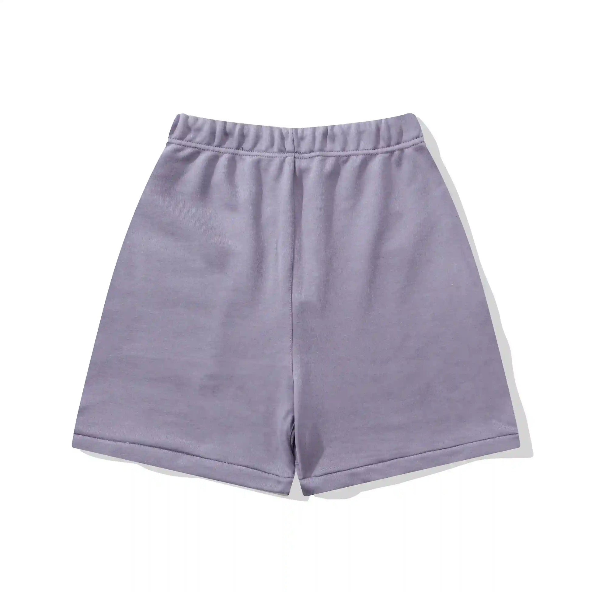Fear of God Essentials Pastel Purple fleece shorts relaxed fit side view