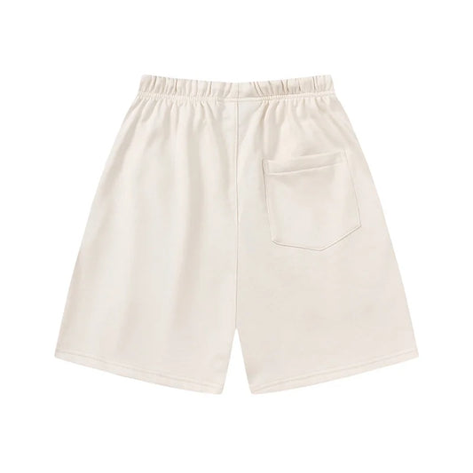 Fear of God Essentials Cloud Dance fleece shorts in light grey with tonal branding