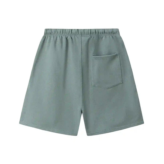 Fear of God Essentials Dawn shorts in beige fleece with tonal logo and relaxed silhouette