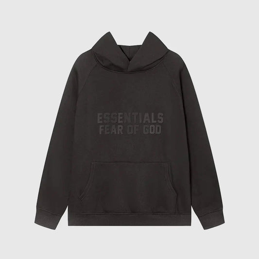 Fear of God Essentials black hoodie front view with rubberized black bar branding
