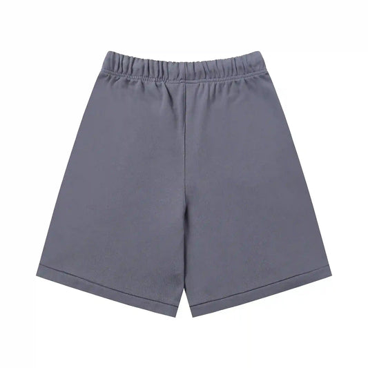 Fear of God Essentials Pastel Purple fleece shorts relaxed fit side view
