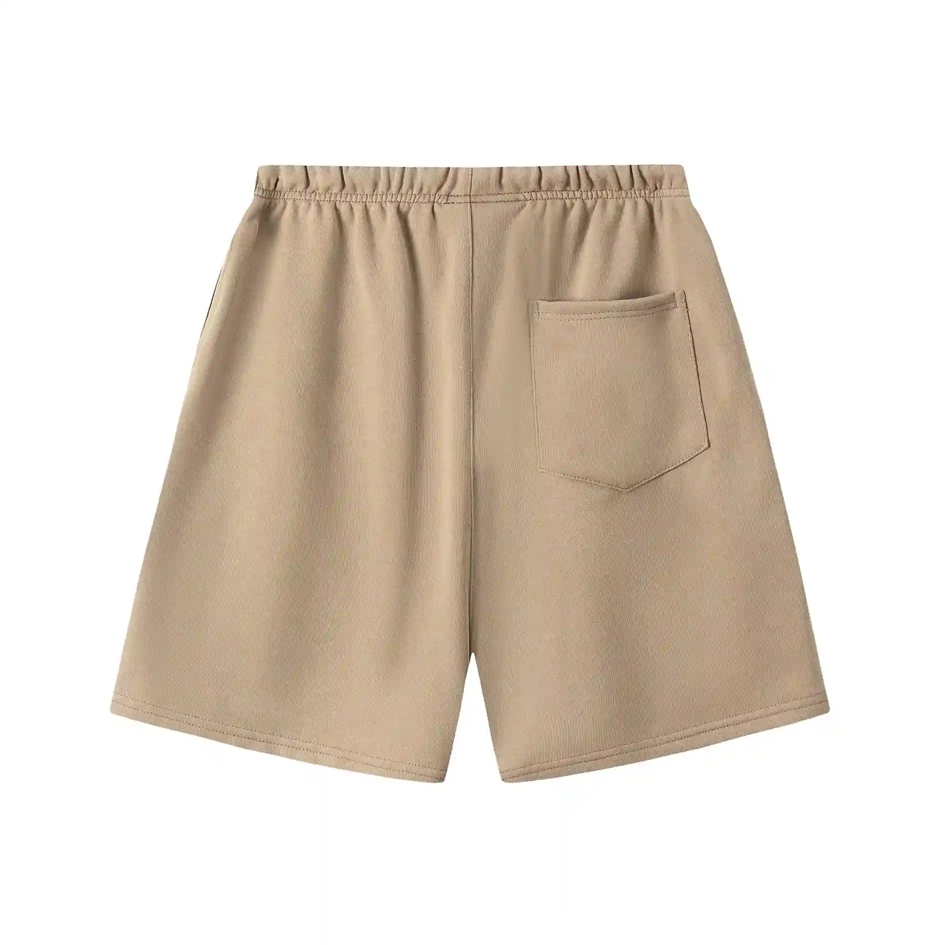 Fear of God Essentials Calm Shell fleece shorts in beige with tonal branding and relaxed silhouette