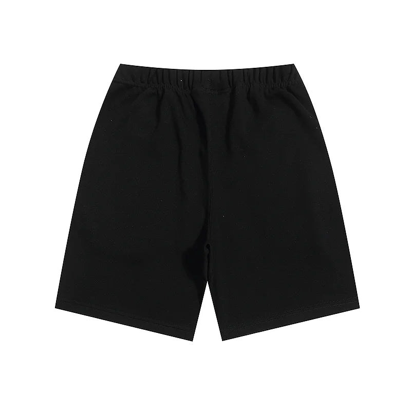 Fear of God Essentials Black fleece shorts relaxed fit side view