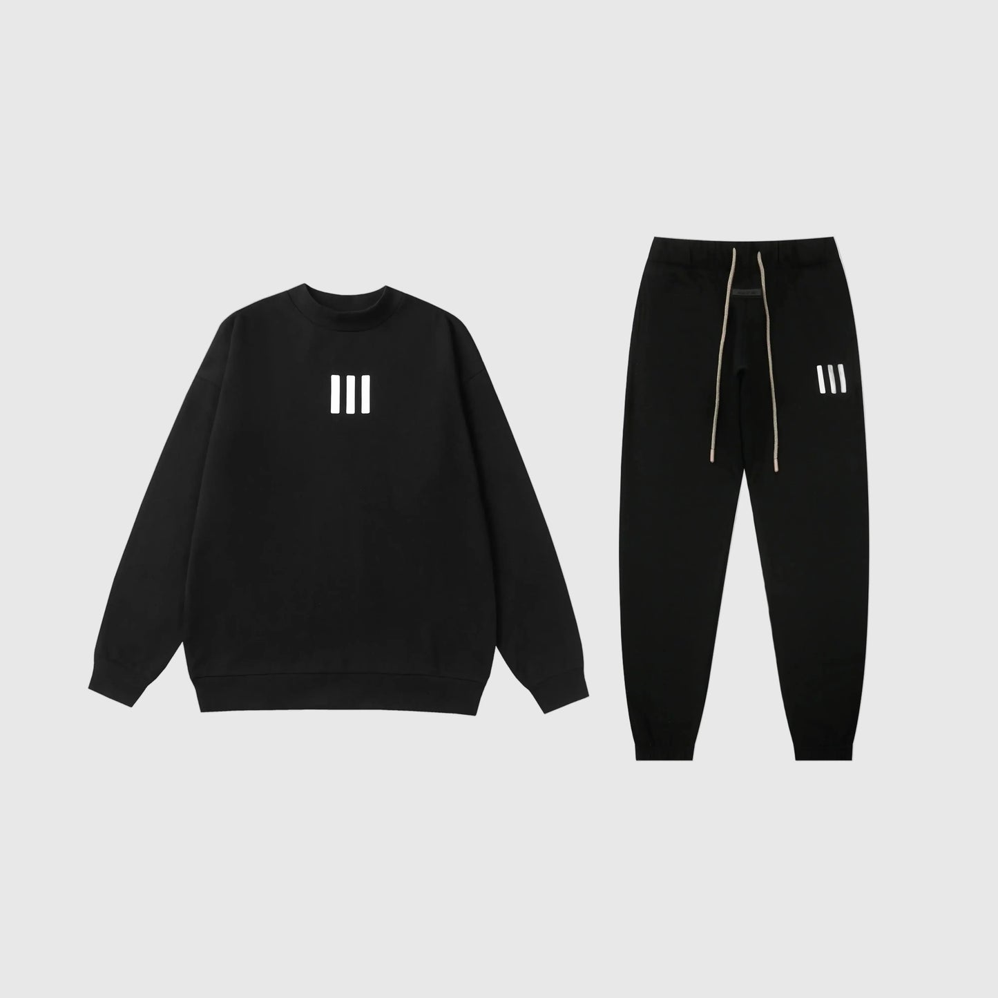Essentials black easy comfort fleece tracksuit set with relaxed fit by Fear Of God