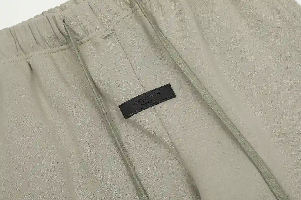 Premium fleece fabric detail on heathered grey sweatpants by Fear of God