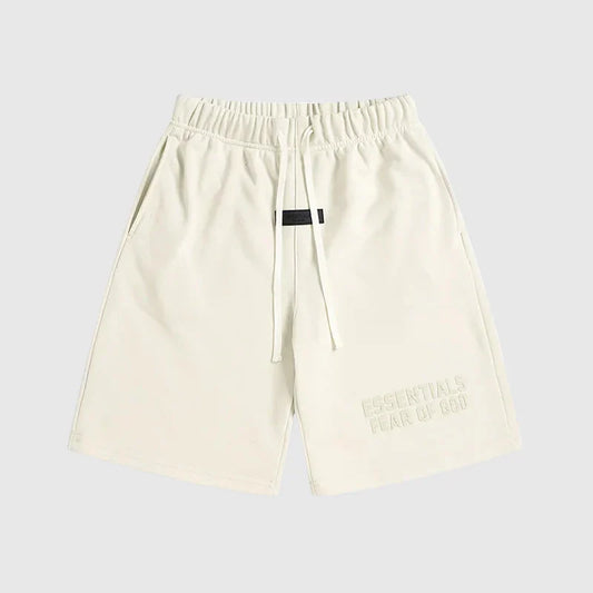 Fear of God Essentials Cloud Dance shorts in soft white fleece with relaxed fit and tonal branding