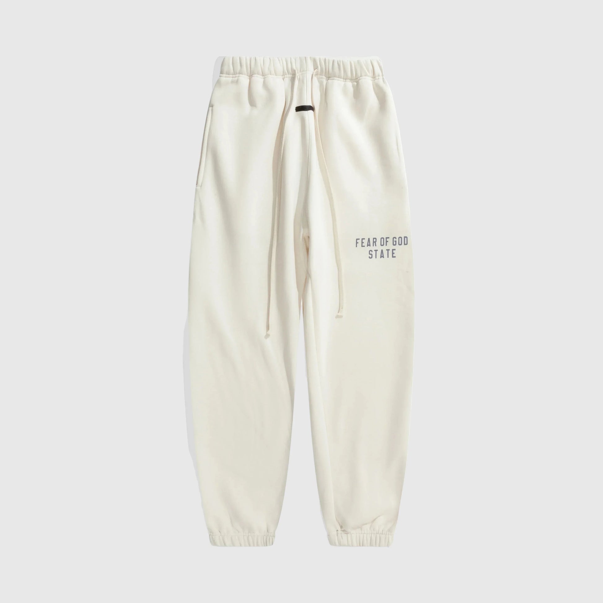 Essentials cloud dance refined fleece sweatpants by Fear of God front view