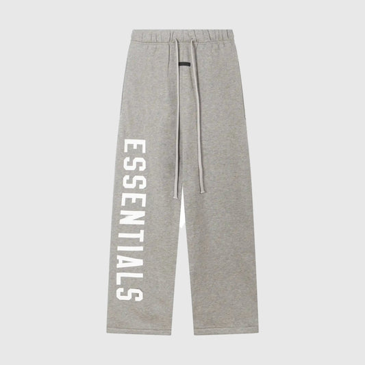 Essentials light heather oatmeal street fleece sweatpants by Fear of God front view