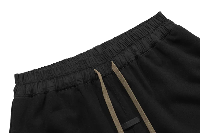 Essentials Black shorts tonal rubberized logo leg detail