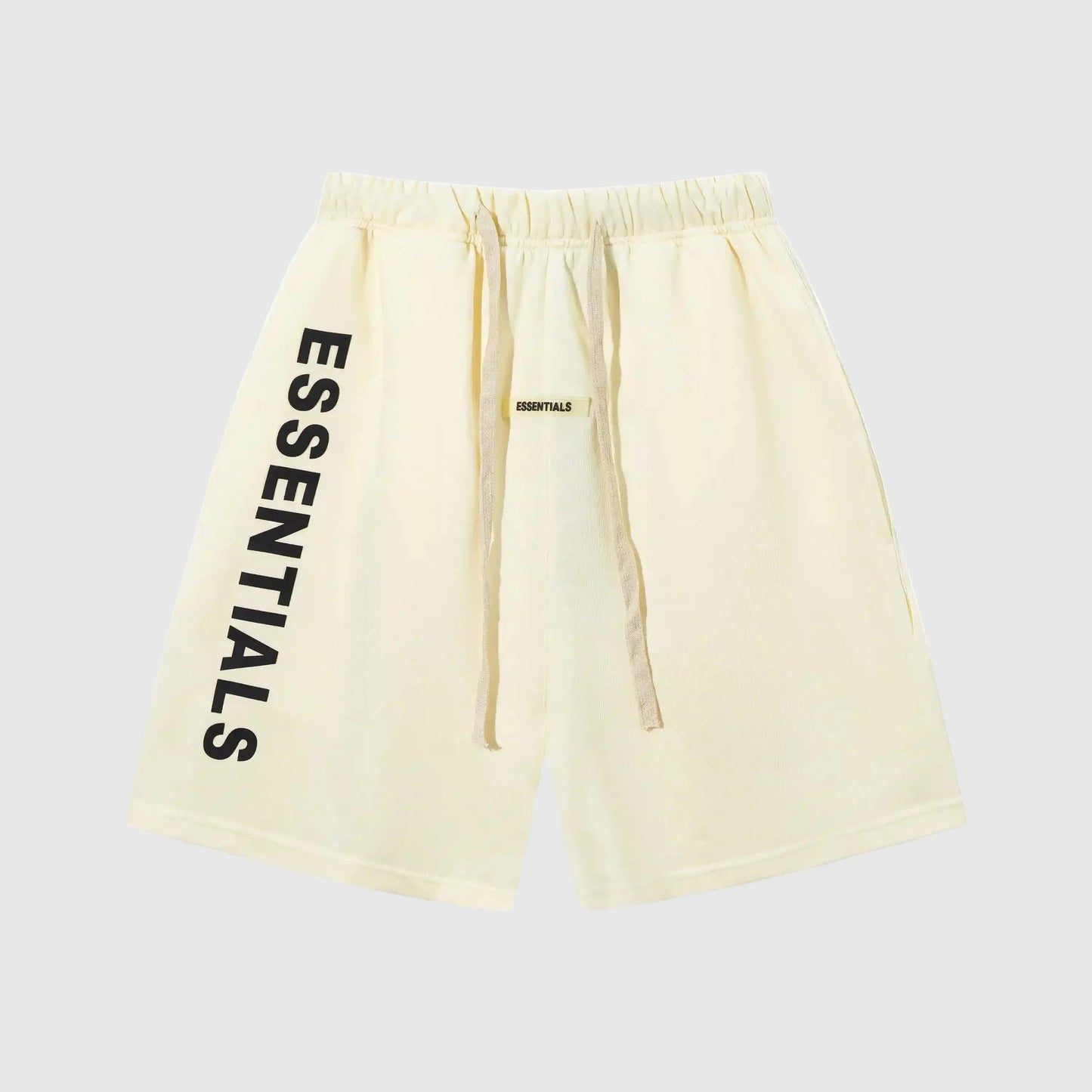 Essentials Light Cream fleece shorts front view – Fear of God