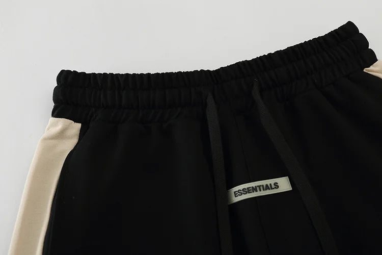 Essentials Black shorts tonal rubberized logo leg detail