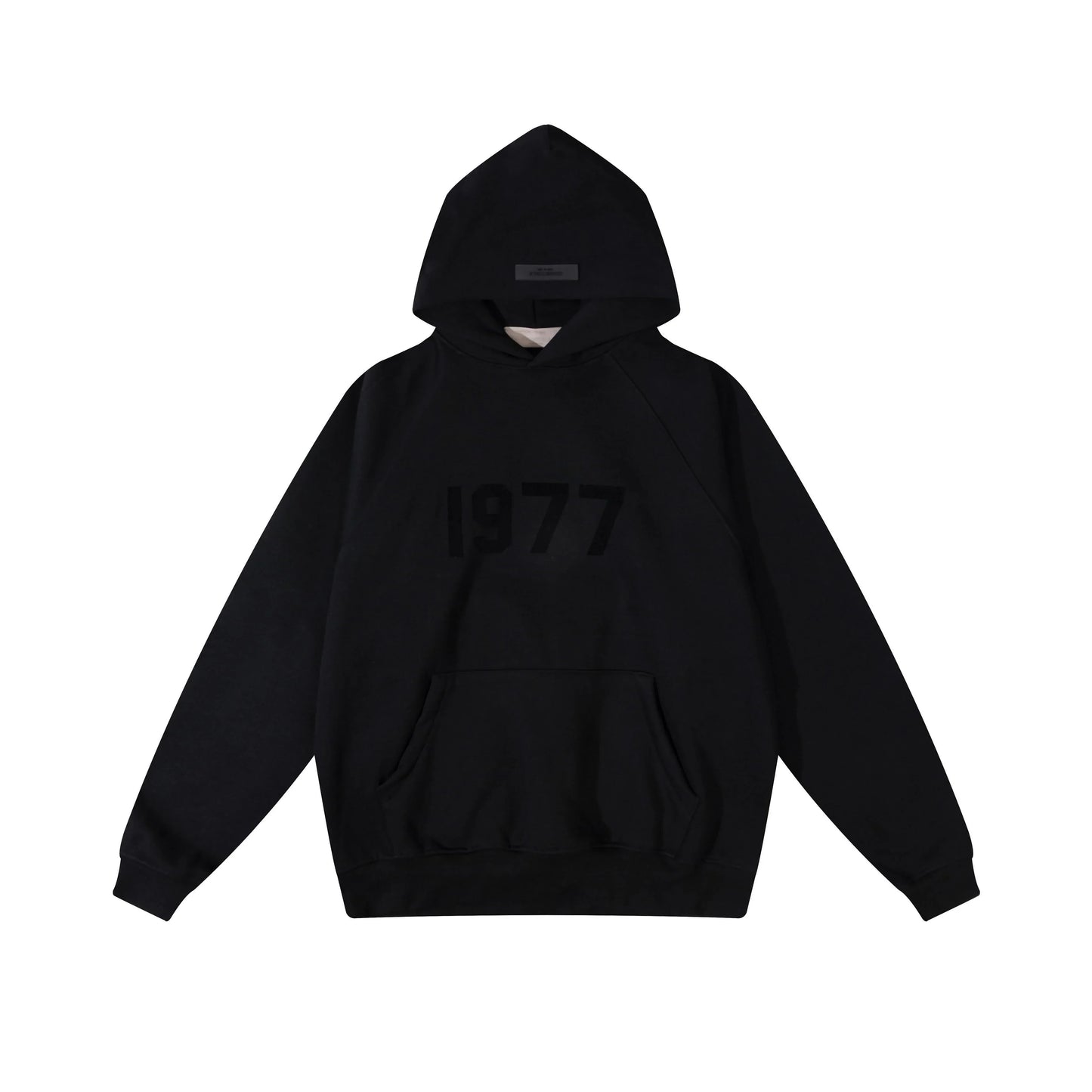 Black Essentials hoodie center front rubberized black bar branding close-up