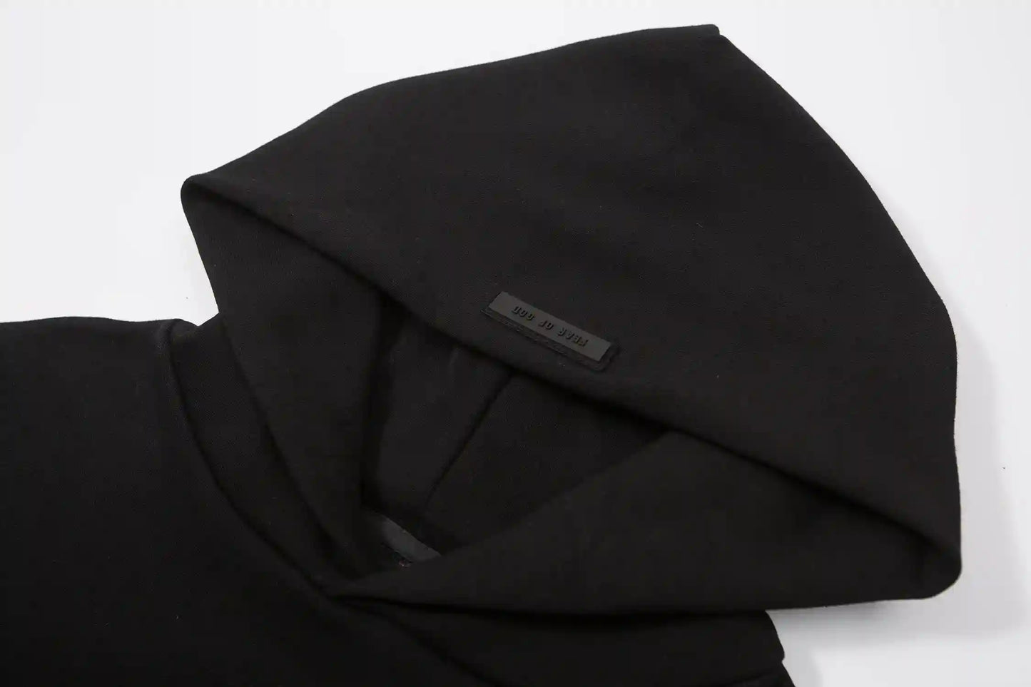 essentials black hoodie interior fleece texture detail