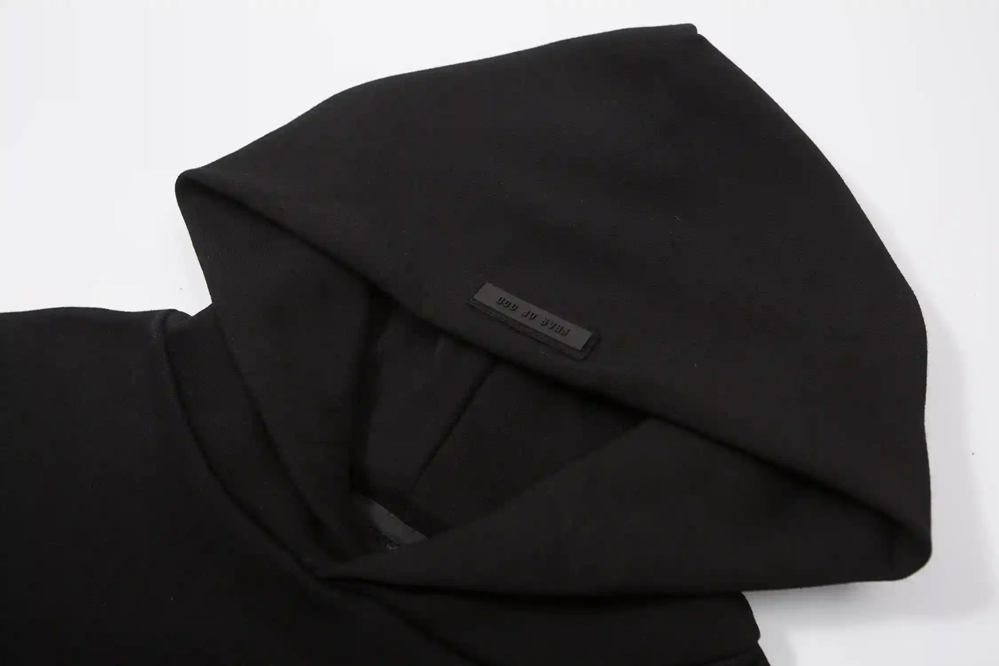 essentials black hoodie interior fleece texture detail