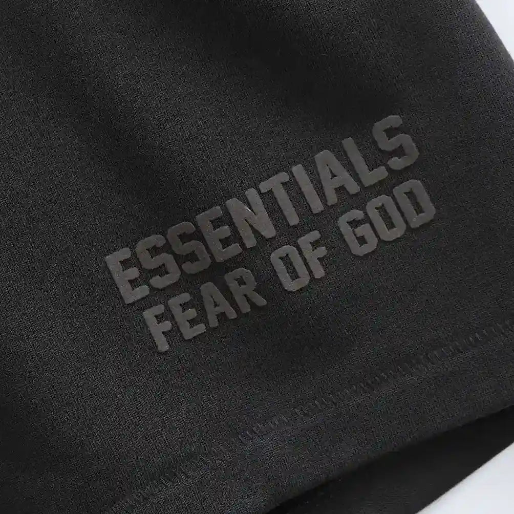Essentials Black shorts tonal rubberized logo leg detail