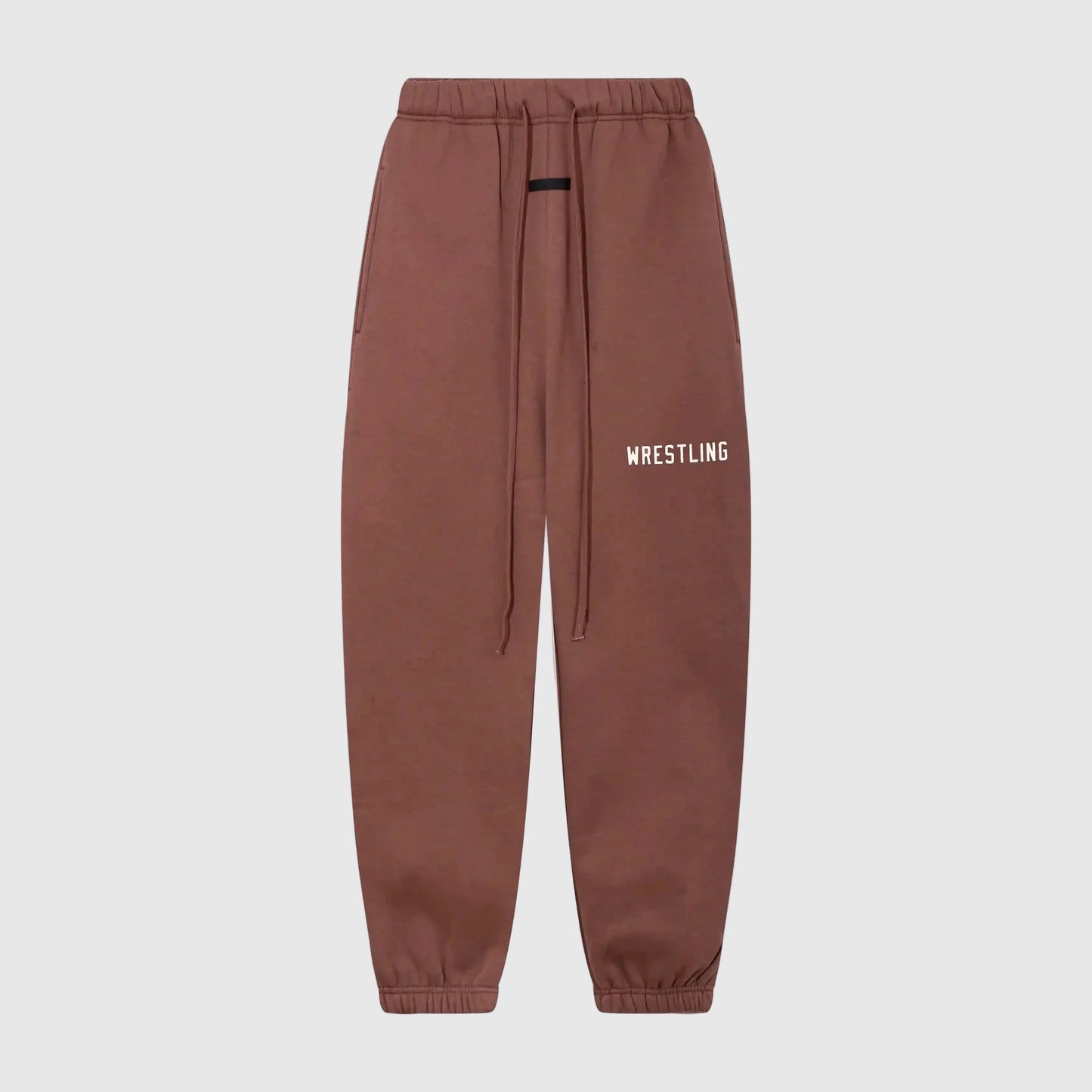 Essentials dark chestnut urban fleece sweatpants by Fear of God front view