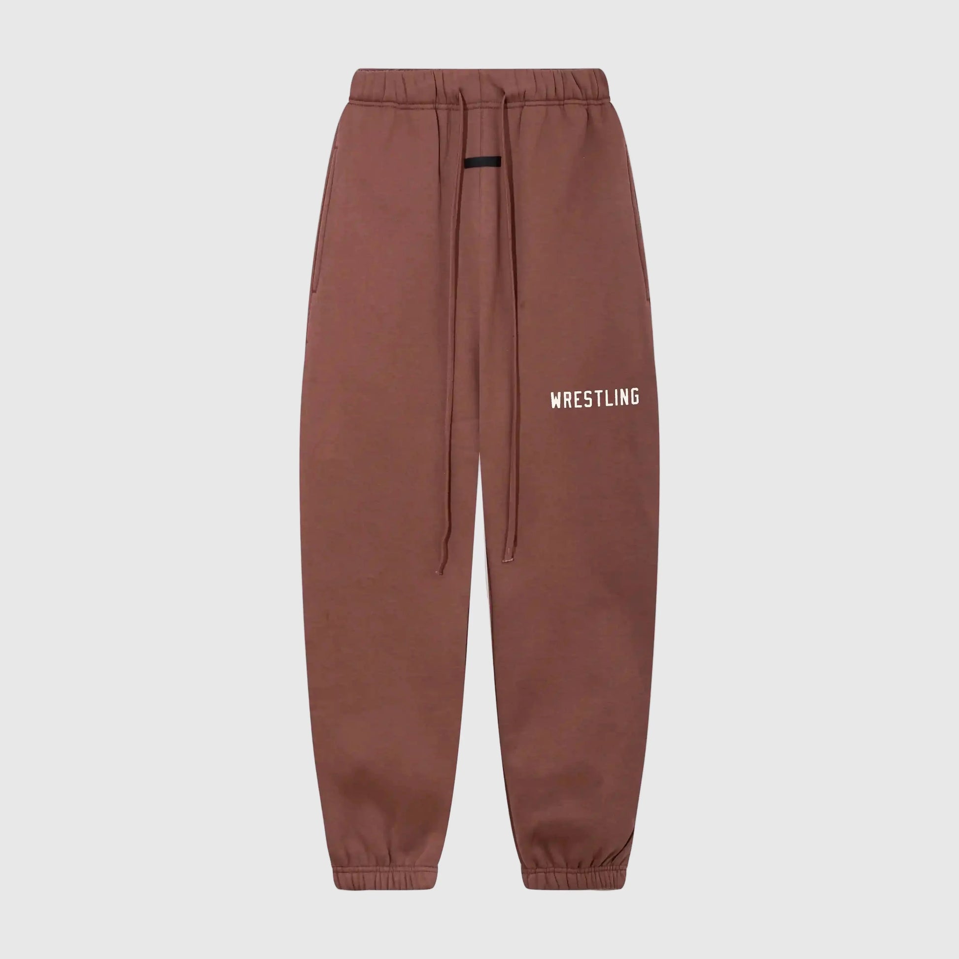 Essentials dark chestnut urban fleece sweatpants by Fear of God front view