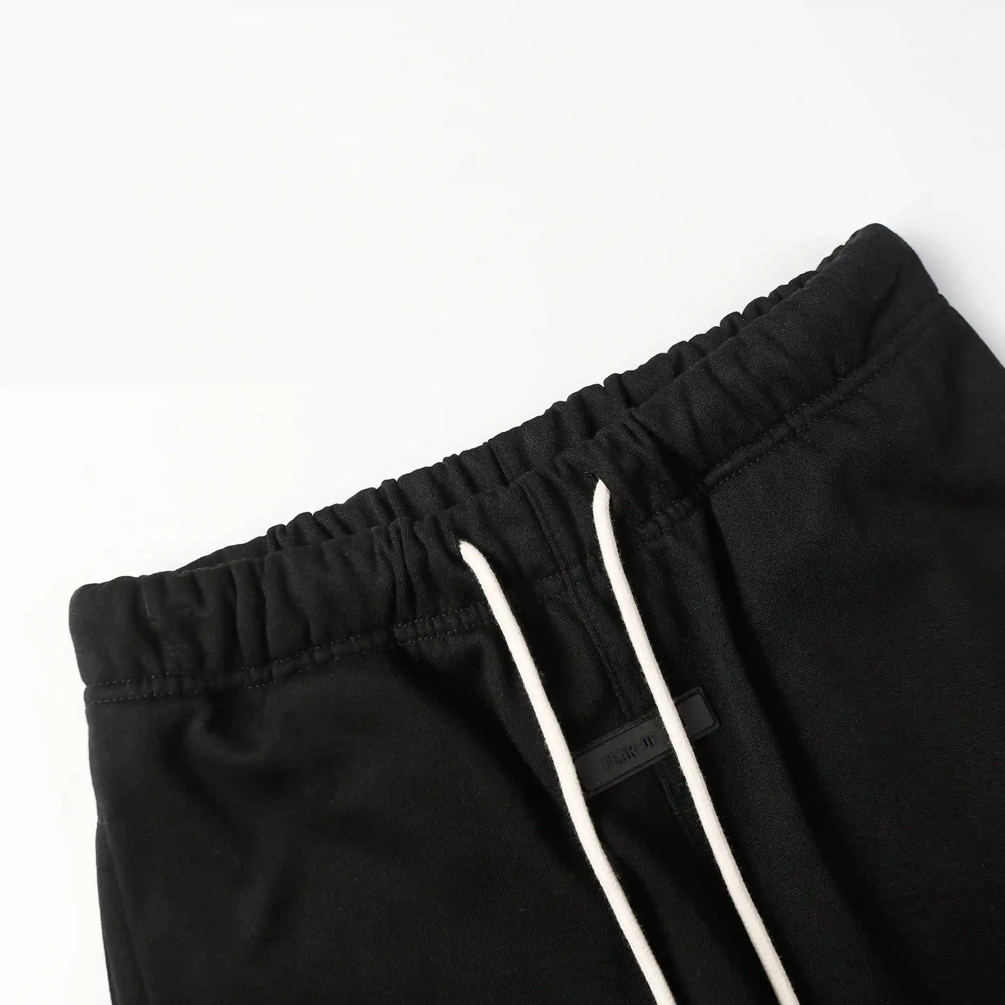 Premium fleece fabric detail on black sweatpants by Fear of God