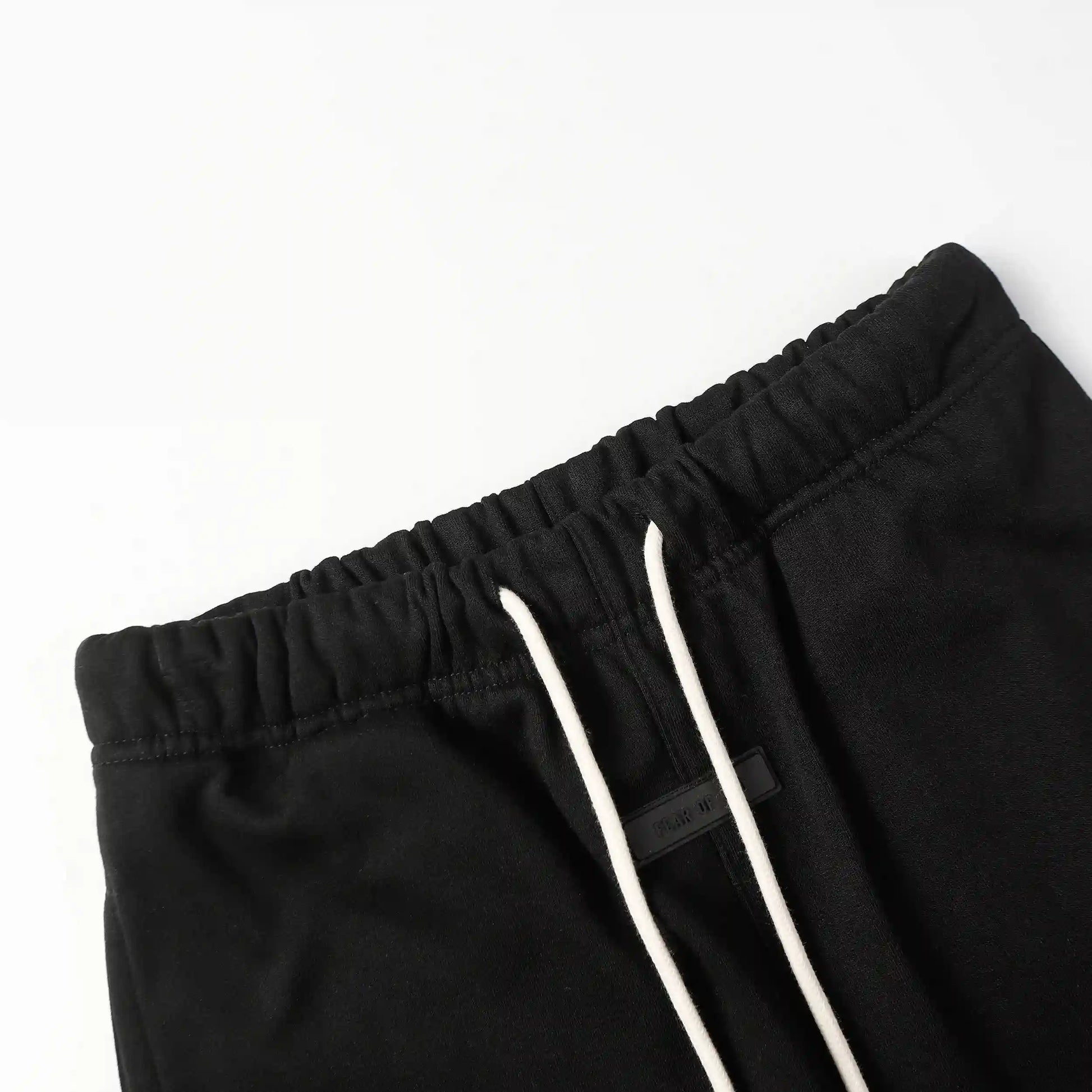 Premium fleece fabric detail on black sweatpants by Fear of God