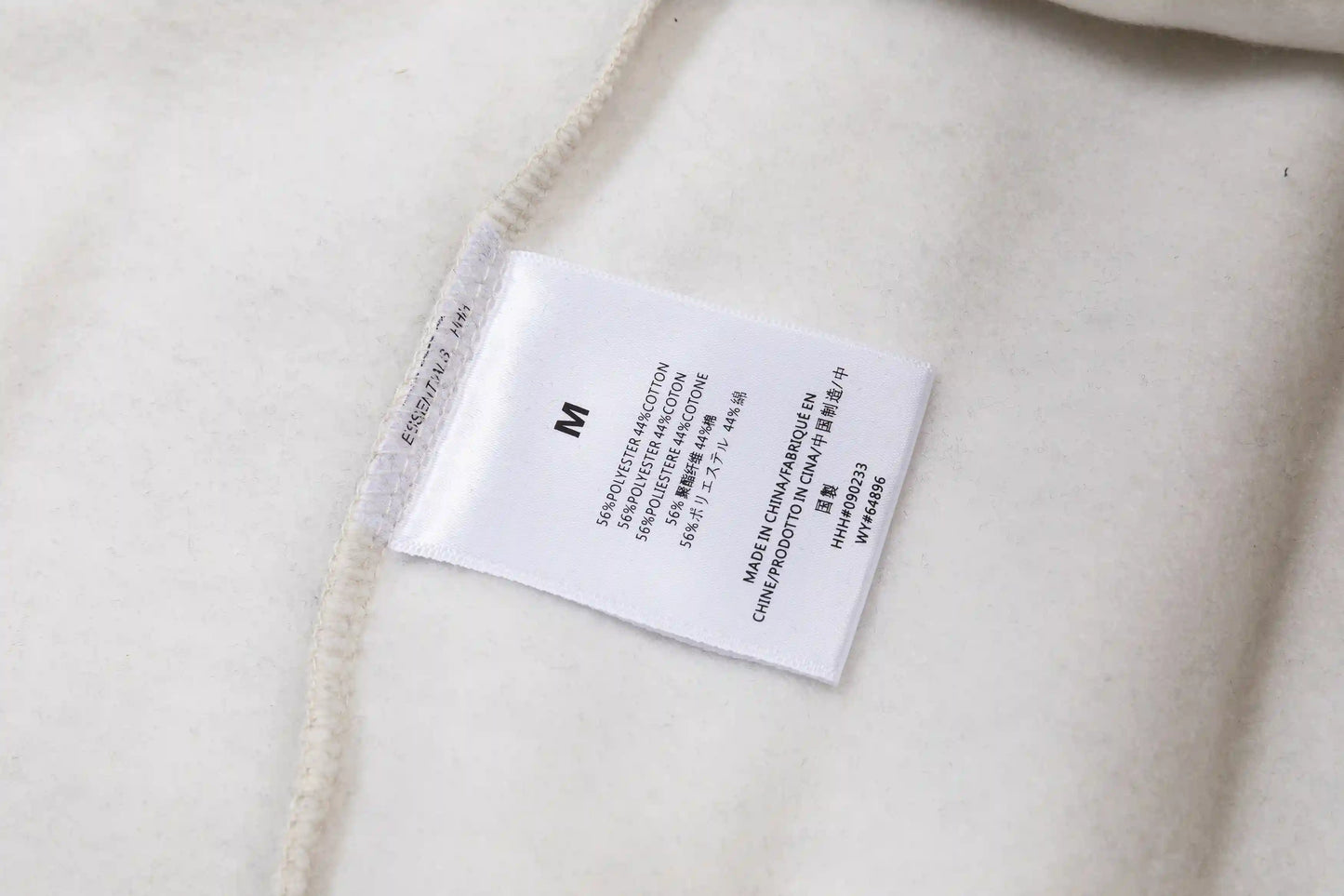 Fear of God ESSENTIALS Light Heathered Oatmeal Hoodie