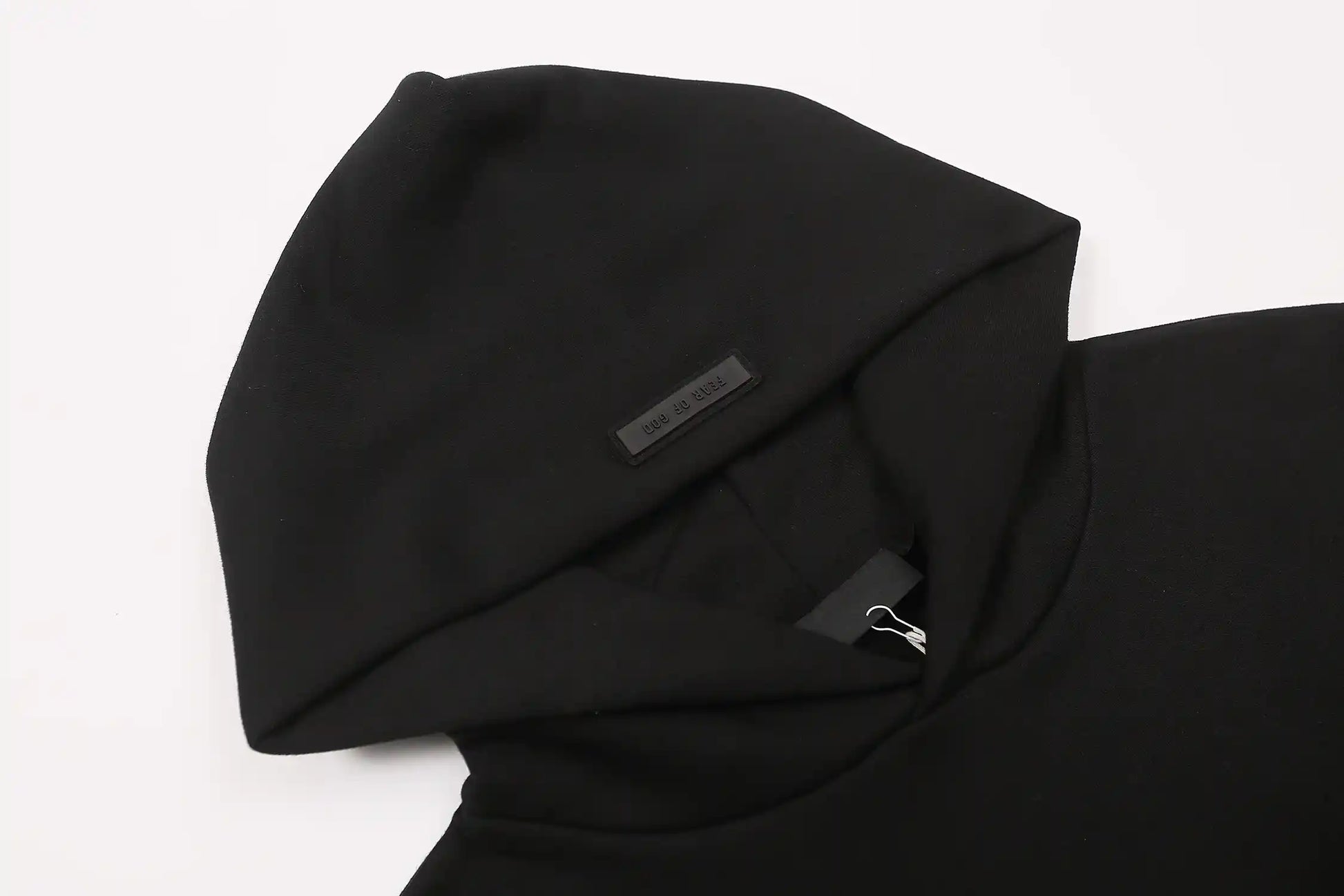 essentials black hoodie front view minimalist design