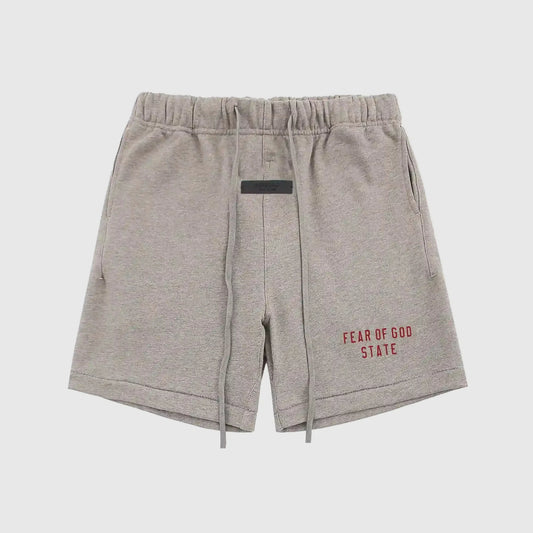 Essentials Light Heather Oatmeal fleece shorts front view – Fear of God