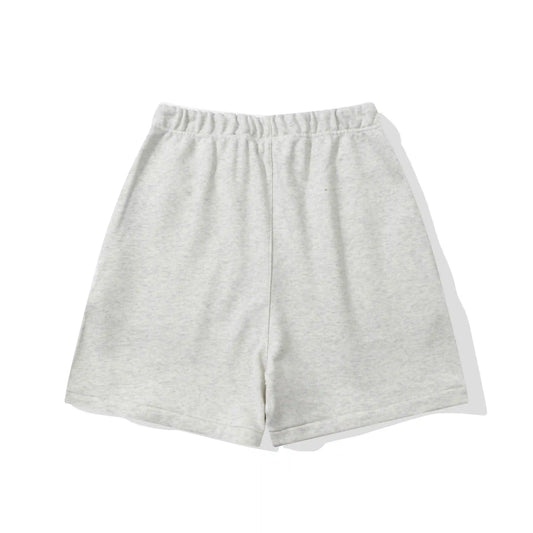 front view of Essentials blue lounge shorts by Fear of God