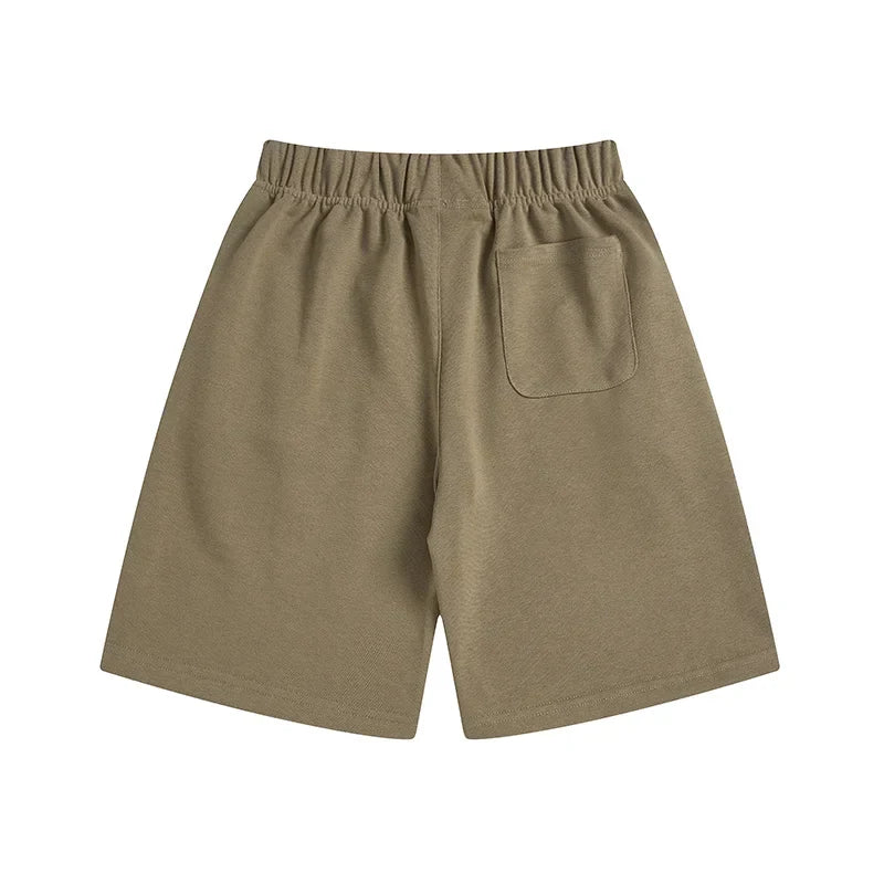 Fear of God Essentials Dark Beige fleece shorts relaxed fit side view