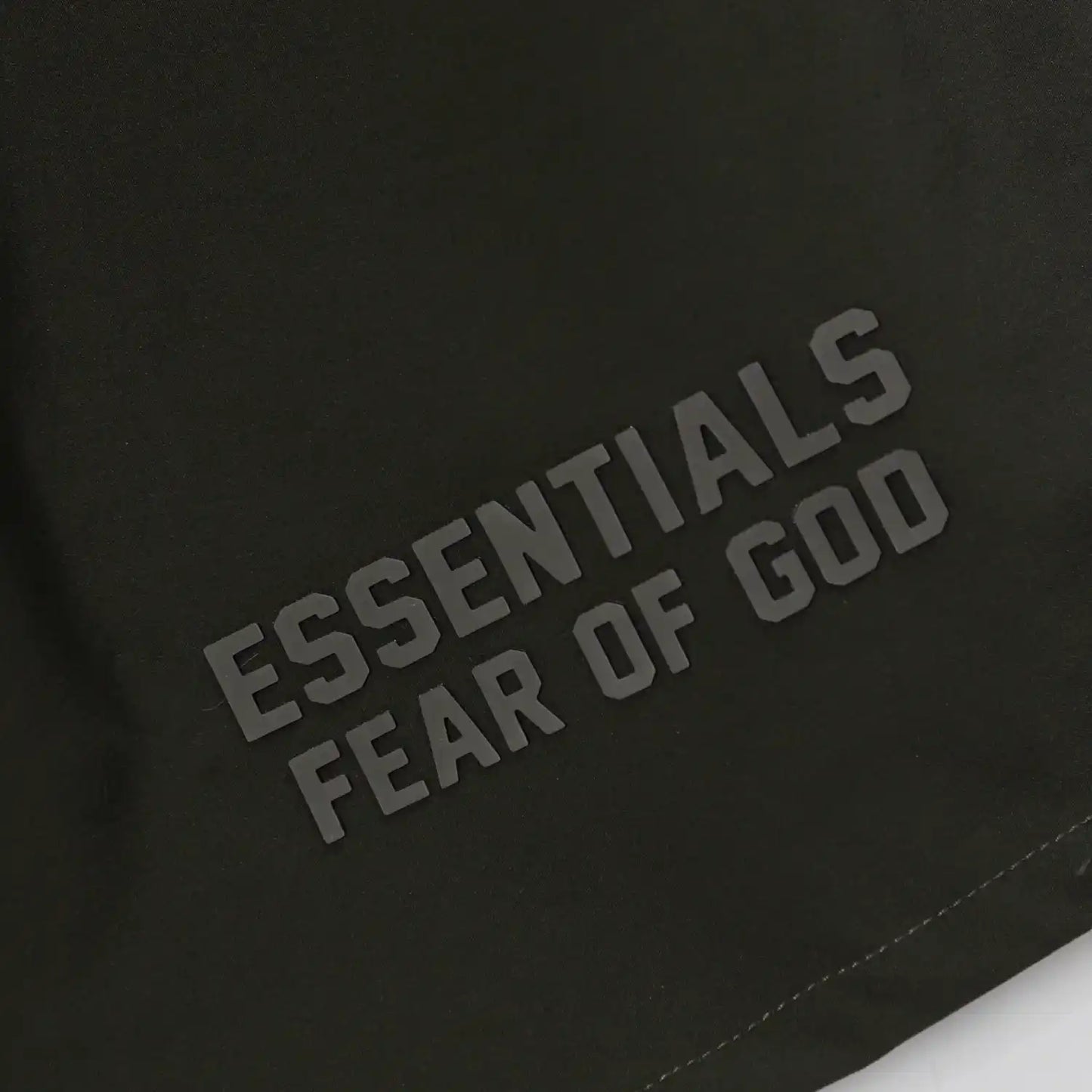 Fear of God Essentials Hemlock green fleece shorts with tonal logo and drawstring waistband