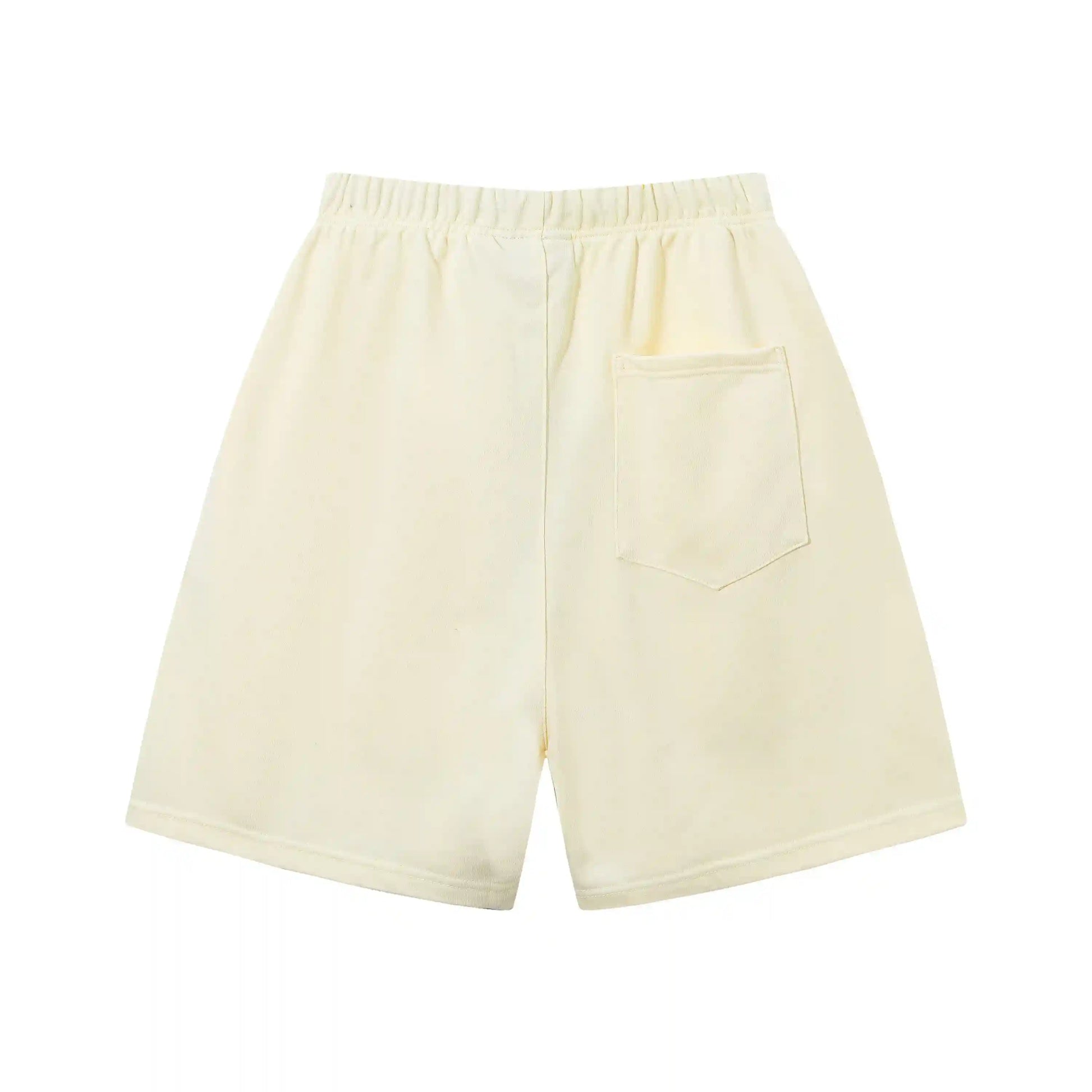 Fear of God Essentials Light Cream fleece shorts relaxed fit side view