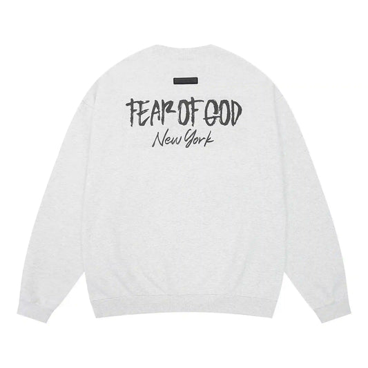 Essentials eggshell sweatshirt back view beveled metallic logo branding