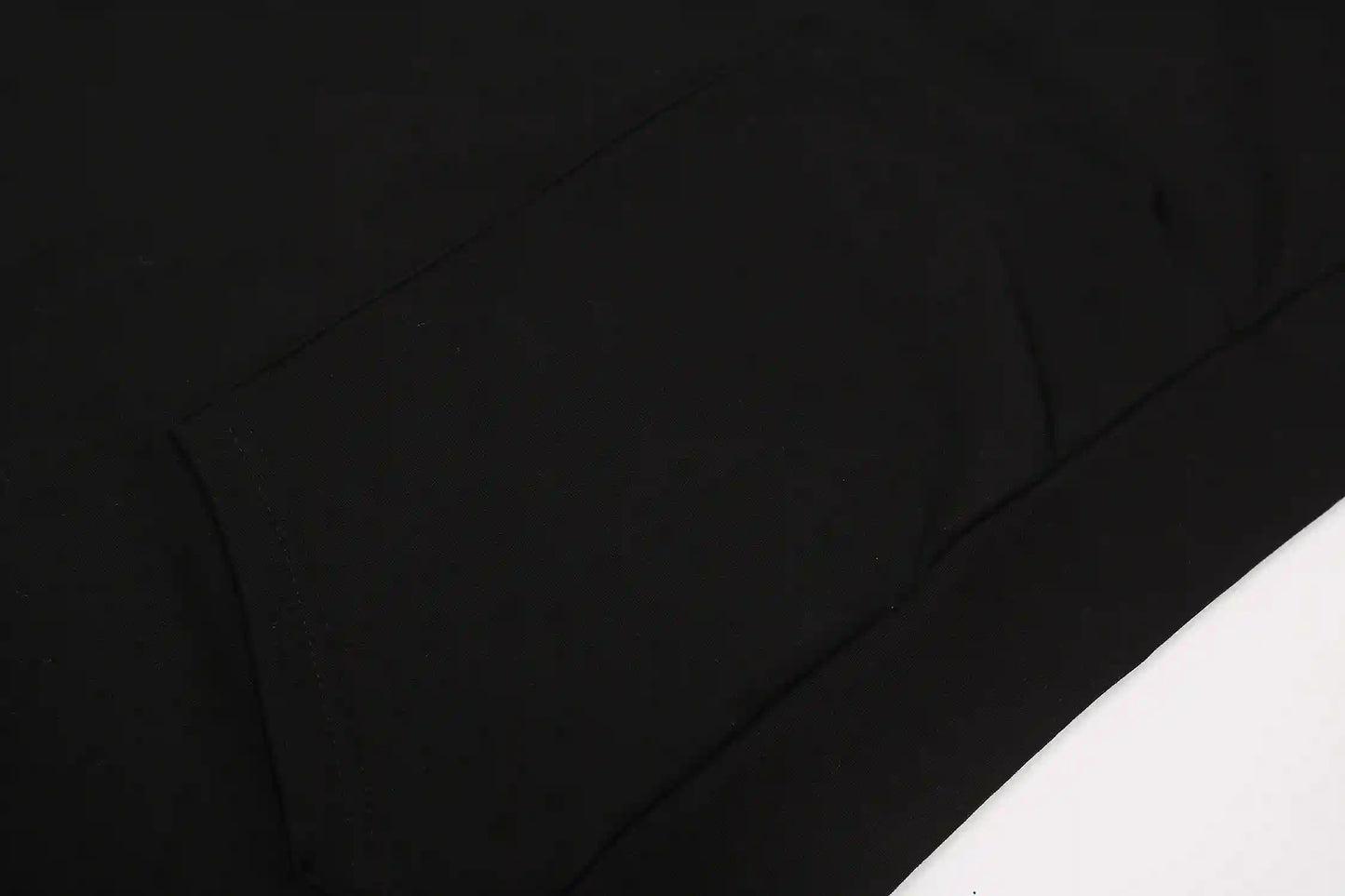 essentials black hoodie ribbed cuffs and hem detail