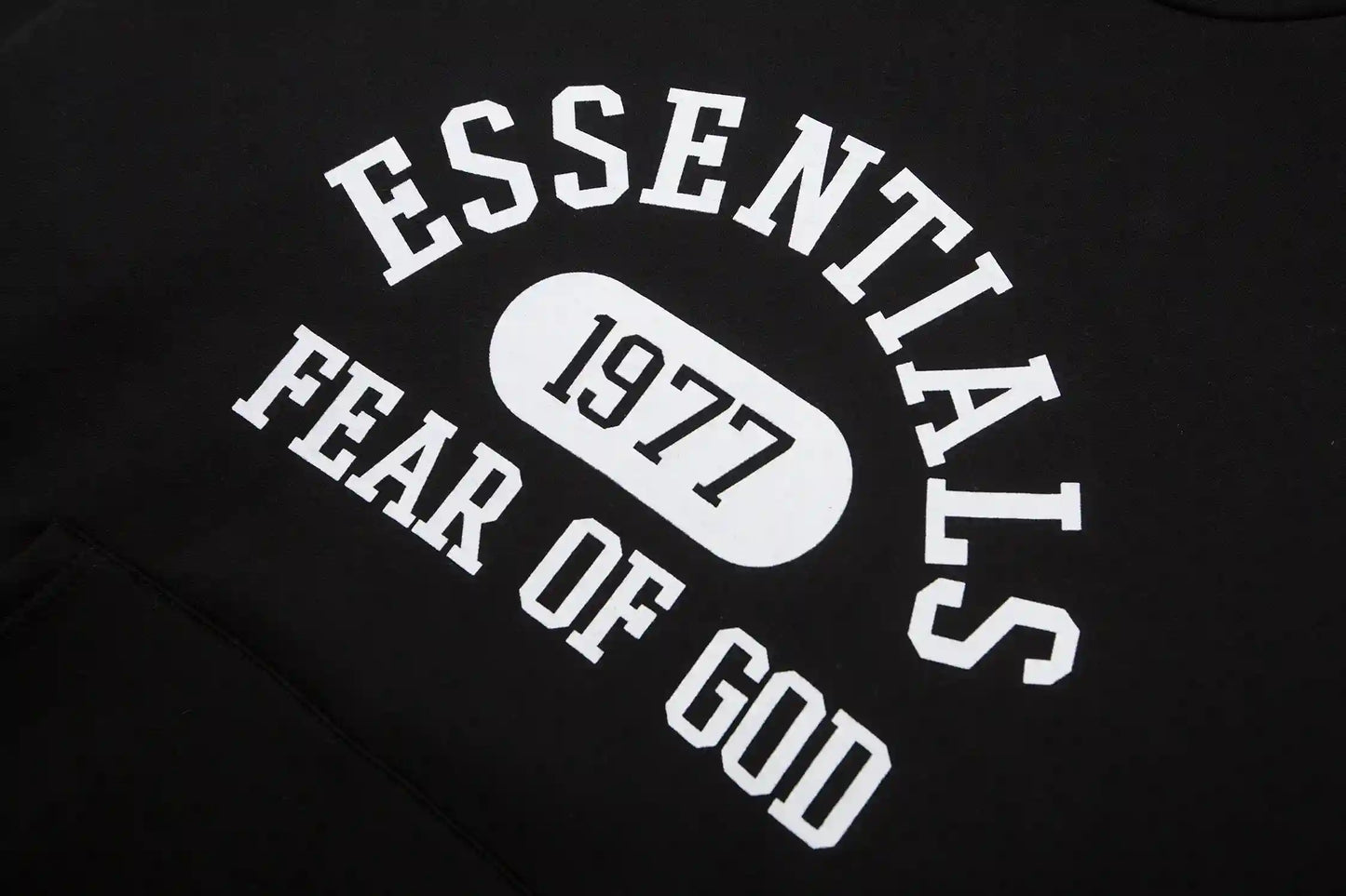 essentials black hoodie ribbed cuffs and hem detail