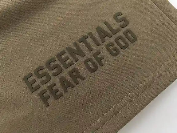 Essentials Dark Beige shorts elastic waistband and drawstring detail