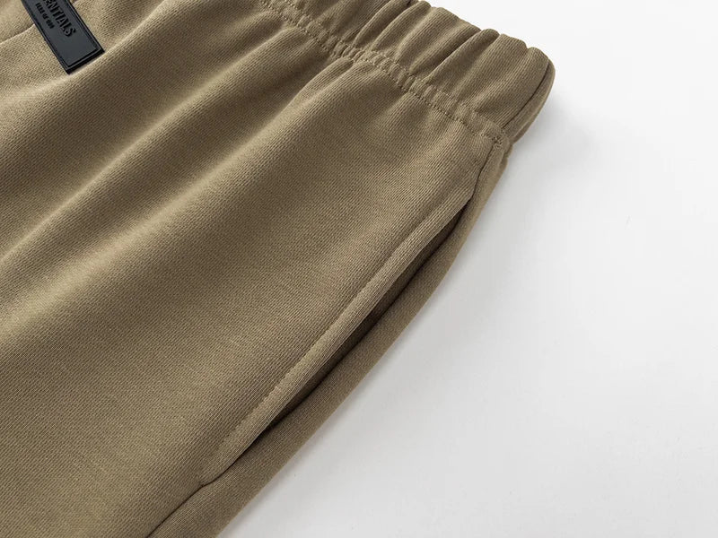 Essentials Dark Beige fleece shorts back view – Fear of God
